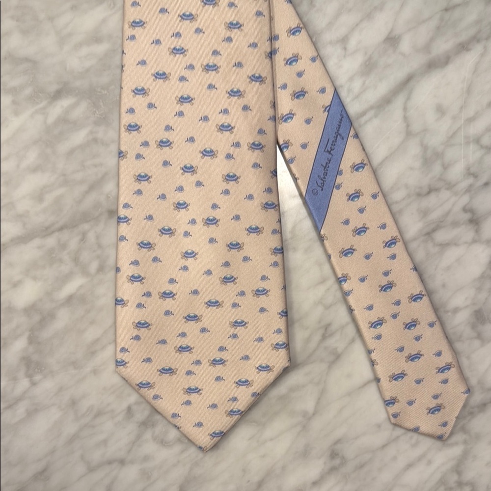 Salvatore Ferragamo Cream Tie with Blue Turtle Motif